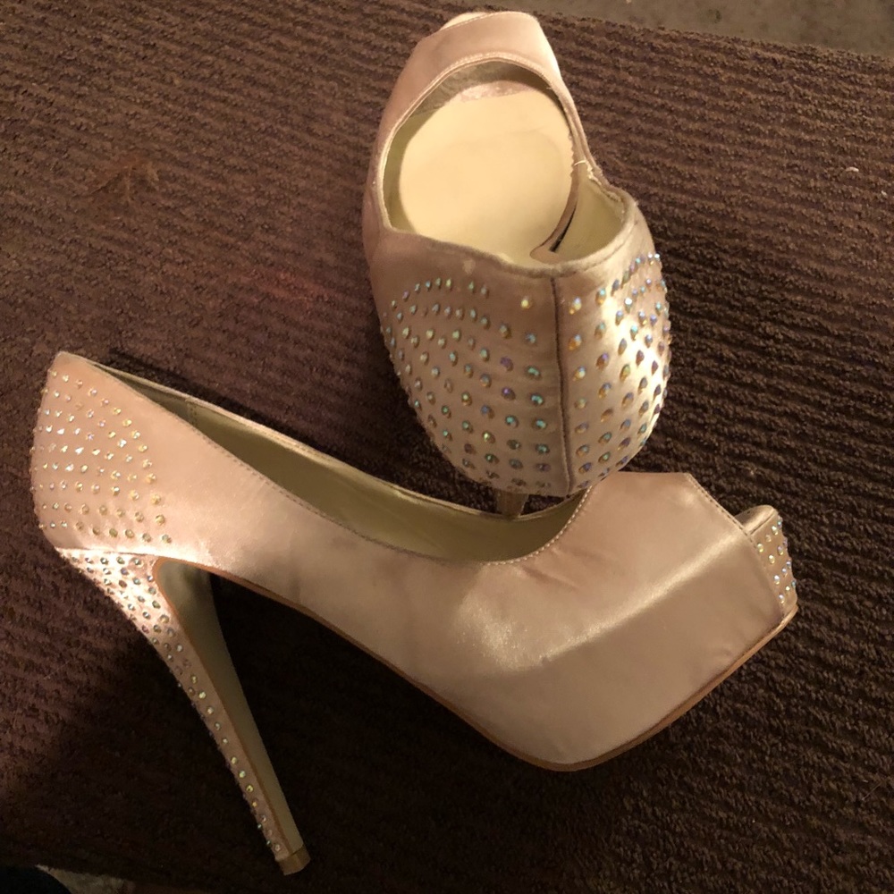 Tan satin pumps with rhinestones